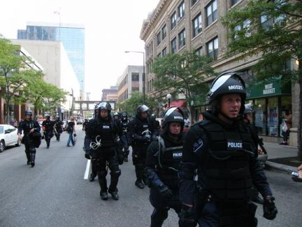 Riot Police arrive to restrain 
peaceful protest at the RNC