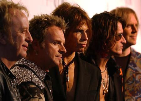 Aerosmith, from left, Brad Whitford, Joey Kramer, Steven Tyler, Joe Perry, Tom Hamilton, in Los Angeles, Sunday, April 14, 2002. Photo by Lucy Nicholson