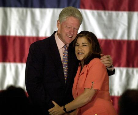 Former President Bill Clinton and Rep. Loretta Sanchez, D-Calif., embrace as Clinton is introduced at a fund-raiser on behalf of the reelection campaign of Sanchez at the Santa Ana Performing Arts and Events Center Thursday, Sept. 5, 2002, in Santa Ana., Calif. Photo by Reed Saxon