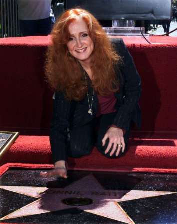 Bonnie Raitt & her new star on the Hollywood Walk of Fame, March 19, 2002. Photo by Rose Prouser