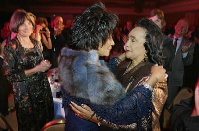 Patti LaBelle and Coretta Scott King embrace before King speaks at the Circles of Hope dinner in San Francisco, Friday, Nov. 22, 2002. LaBelle performed at the fundraising event held in honor of King. Photo by Dave Kennedy