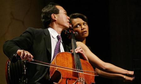 Cellist Yo-Yo Ma performs with Condoleezza Rice, during the National Endowment for the Arts National Medal of Arts Awards ceremony at Constitution Hall, Monday April 22, 2002, in Washington. Photo by Pablo Martinez Monsivais