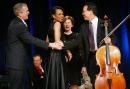 resident Bush, Yo-Yo Ma, Laura Bush & Jose Cisneros, sitting. Photo by Pablo Martinez Monsivais