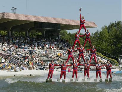 Members of the Cypress Gardens ski show perform a pyramid on skis as they pass the grandstands during the last part of their final performance on the parks last day of operations Sunday, April 13, 2003, in Winter Haven, Fla. Photo by Scott Audette