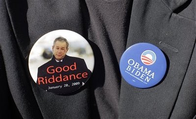 A supporter wears campaign buttons during a rally for Democratic presidential candidate Sen. Barack Obama, D-Ill., Thursday, Oct. 30, 2008, in Sarasota, Fla.  Photo by Jae C. Hong