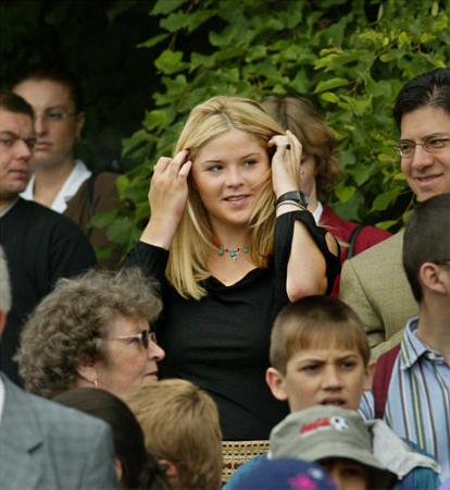 Jenna Bush, 20, center, daughter of President Bush and first lady Laura Bush, watches amid the public as her mother participates in a ceremony at the Terezin cemetery, a former Nazi concentration camp, near Prague in the Czech Republic, Sunday, May 19, 2002. Photo by J. Scott Applewhite