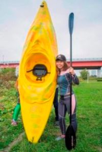 Japanese artist Megumi Igarashi, known as Rokudenashiko, poses with her kayak modeled on her vagina at the Tama river in Tokyo in this October 19, 2013 picture provided by Eigo Shimojo. Igarashi, who made figures of Lady Gaga and the kayak, said on July 16, 2014 from jail she was 'outraged' by her arrest and vowed a court fight against obscenity charges. Igarashi, 42, says she was challenging a culture of 