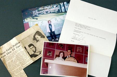 Elvis Presley memorabilia from the personal collection of Associated Press Correspondent Linda Deutsch shows her in photographs and mentioned in a letter and newspaper article, in this photo taken Friday, Aug. 9, 2002, in Burbank, Calif. The vintage items include a 1962 letter from Elvis congratulating Deutsch on her high school graduation, a yellowed newspaper clipping from her hometown New Jersey paper, The Asbury Park Press, about her Elvis fan clubs campaign to have Dick Clark devote an entire show of American Bandstand to Elvis music on his 24th birthday, and a photo of her with Clark on ''American Bandstand''