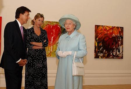 Sir Paul McCartney, with his wife, Heather Mills, center, show Britain's Queen Elizabeth II his paintings during a visit Thursday July 25, 2002 to the Walker Art Gallery in Liverpool, England where he has an exhibition. Photo by John Giles