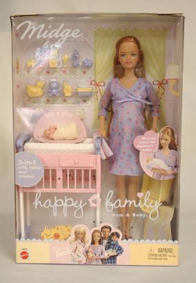The pregnant version of Midge, Barbie's oldest friend, which pops out a curled-up baby when her belly is opened, is seen Tuesday, Dec. 24, 2002 in Philadelphia