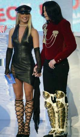 Britney Spears and Michael Jackson present an award at the 2002 MTV Video Music Awards at Radio City Music Hall in New York on August 29, 2002. Photo by Gary Hershorn