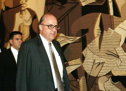 United States Ambassador to the United Nations, John Negroponte arrives at Security Council consultations regarding a multinational force in Liberia at United Nations headquarters Friday, Aug. 1, 2003. Photo by David Karp   [ironic background?]