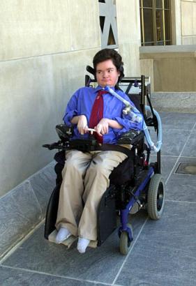 Nick Dupree arrives at the Federal Courthouse in Montgomery, Ala. on Tuesday, Feb. 11, 2003. Dupree, a quadriplegic from Mobile, Ala., was due to lose home care services provided by Medicaid when he turns 21 this month, until a waiver for Alabama's seriously disabled Medicaid recipients was announced by the national Medicaid office Monday night. Photo by Jamie Martin