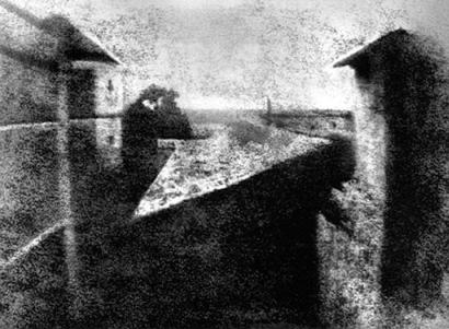 This version of the 1826 image, widely acknowledged as the world's earliest photograph, is a hand-retouched mosaic compiled from several partial images after it was rediscovered in 1952 by photo historians Helmut and Alison Gernsheim. A fresh, unmanipulated version of the image was unveiled Friday, Nov. 21, 2003, during an Austin, Texas, symposium celebrating the life and work of pioneer photographer Joseph Nicephore Niepce.