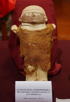 This ceramic piece of Chancay Culture, dating from 12 A.D, is shown by the Foreign Ministry Wednesday, July 13, 2005 in Lima, Peru. The Peruvian government recovered the 291 pieces from within Canada and Italy. The pieces were removed from Peru to be sold to collectors of both countries. Photo by Martin Mejia