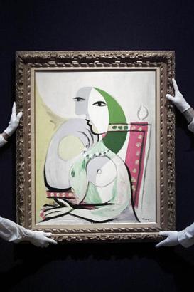 Pablo Picasso's 1932, Femme dans un fauteuil, or Woman in an armchair, is hung at Christie's auction house, London, Thursday, Jan. 30, 2003. The painting which will be auctioned on Feb. 3, 2003 has an estimated price of $6.4 to $9.6 million. Photo by Max Nash