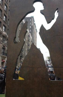 The 'Invisible Man' sculpture stands in front of the longtime home of acclaimed author Ralph Ellison in New York's West Harlem Thursday May 1, 2003. Photo by Frank Franklin II