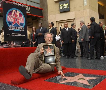 Film director Steven Spielberg poses for photographers after receiving the 2,210th star in front of the Kodak Theater on the Hollywood Walk of Fame in Los Angeles, Friday, Jan. 10, 2003. Spielberg's latest film is 'Catch Me if You Can.' Photo by Chris Pizzello